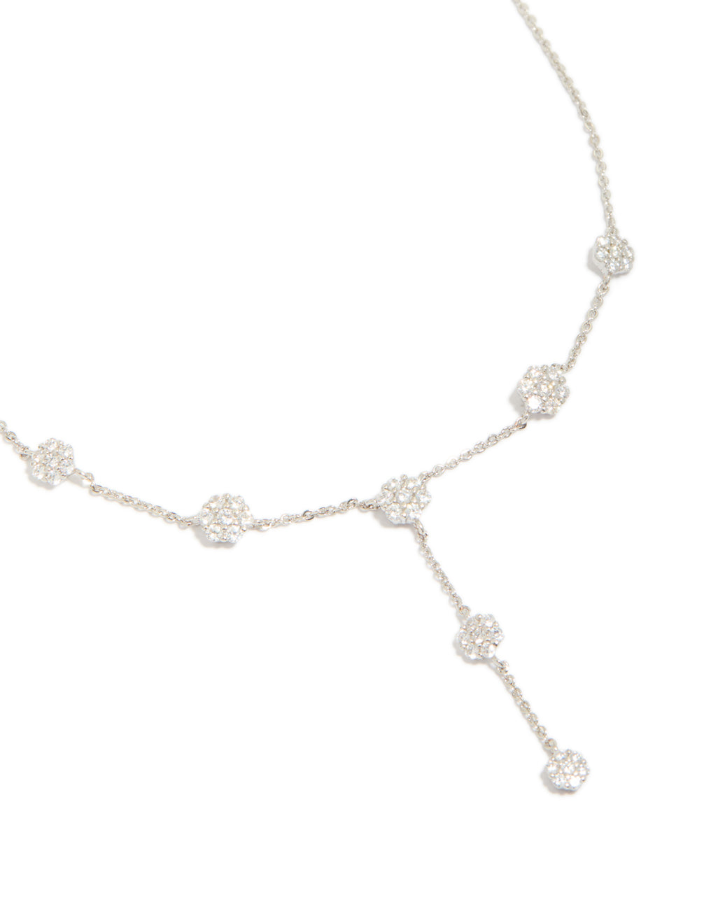 Beautifully crafted cubic zirconia mini floral y necklace in dainty silver close up view