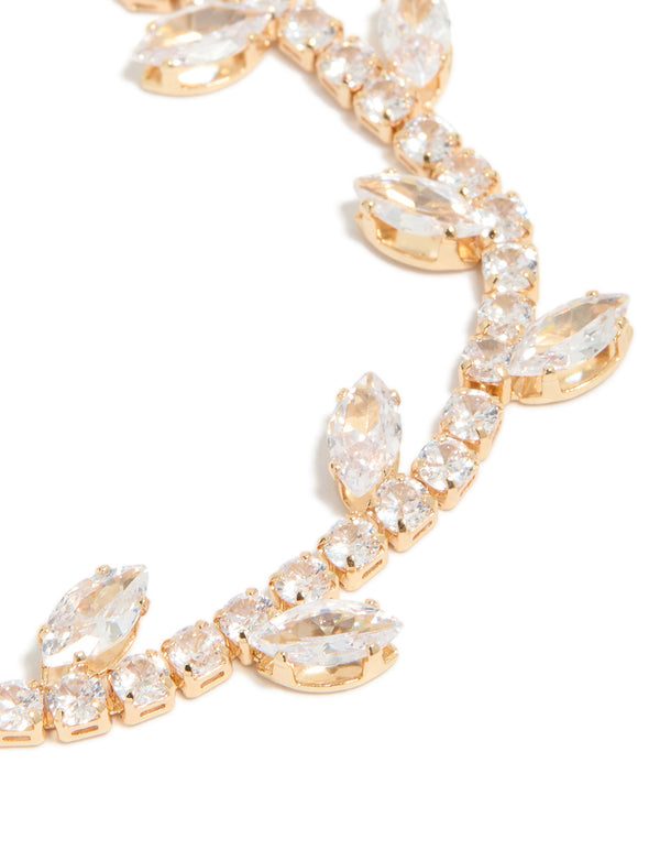 Exquisitely detailed gold cubic zirconia marquise vine bracelet with leaf elements close up view