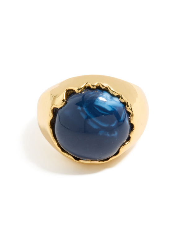 Designed with gold plated and navy accents, oversized blue jewel ring front view