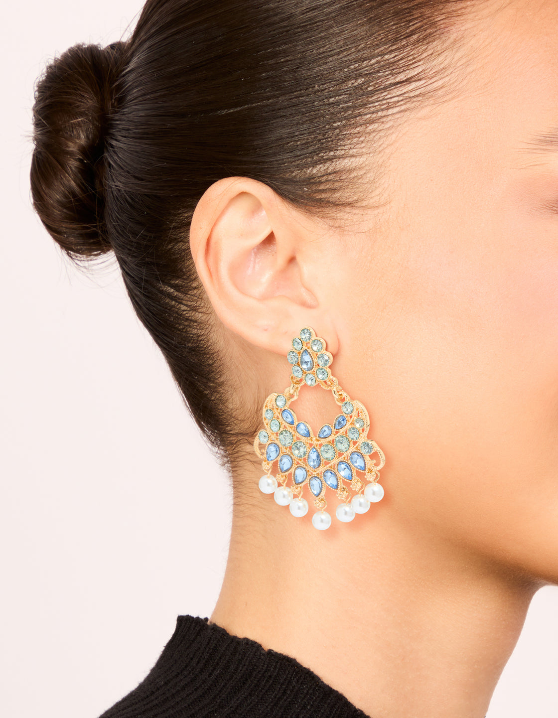 Stunning gold blue diamante and pearl statement drop earrings on ear view