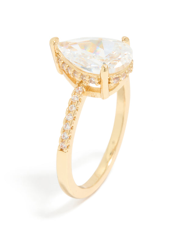 Elegant statement ring crafted from gold plated crystal featuring solitaire pear cubic zirconia side detail view