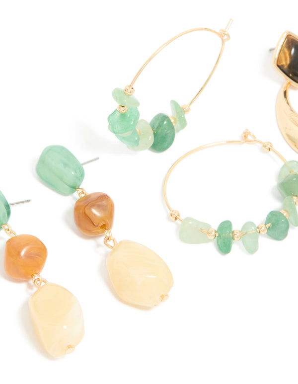 Featuring gold and green acrylic drop and hoop earrings in a 3-pack with beads in a close up view