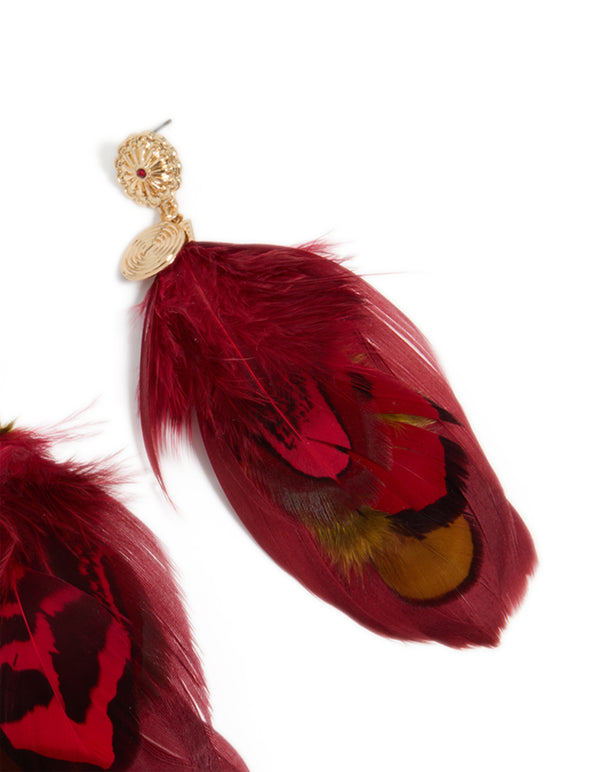 Designed with gold, hot pink and yellow feather, these drop earrings featuring statement style post detail view