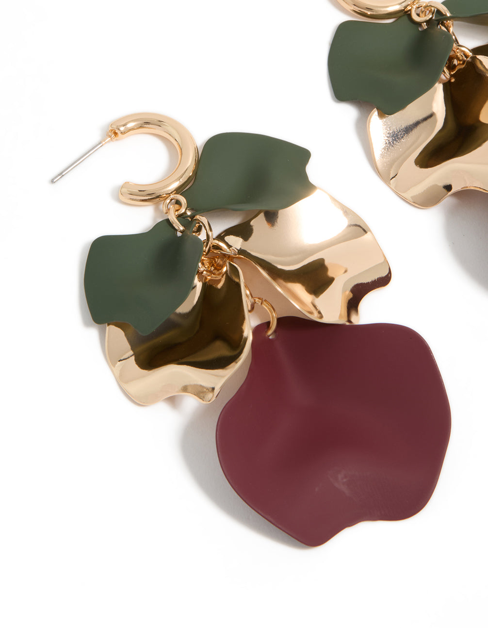 Beautifully designed statement drop earrings with charm featuring five petal floral design in gold green and purple close up view