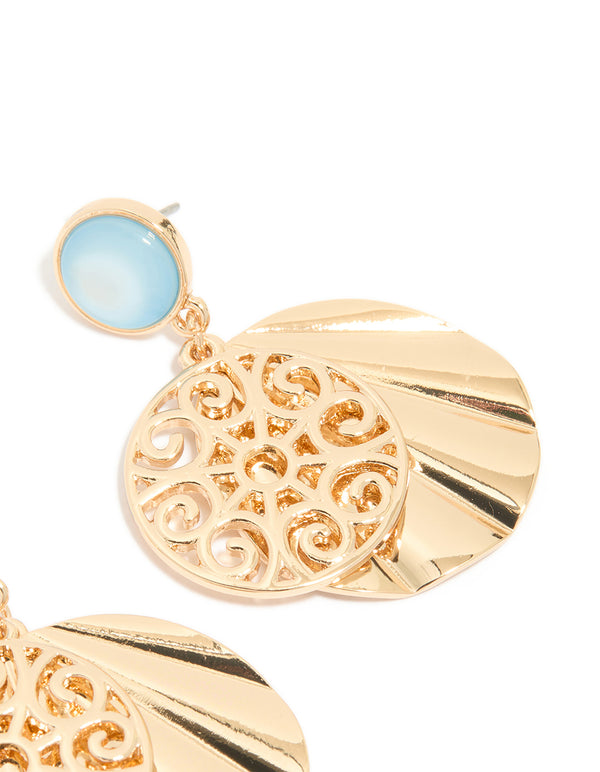 Beautifully crafted gold blue circle and swirl drop earrings featuring light sky blue accents and statement style post detail view