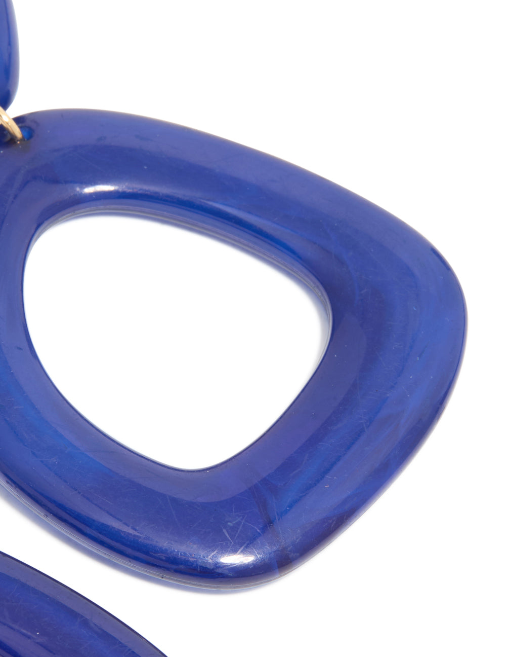 Dark blue acrylic organic square-oval drop earrings with statement style in post detail view
