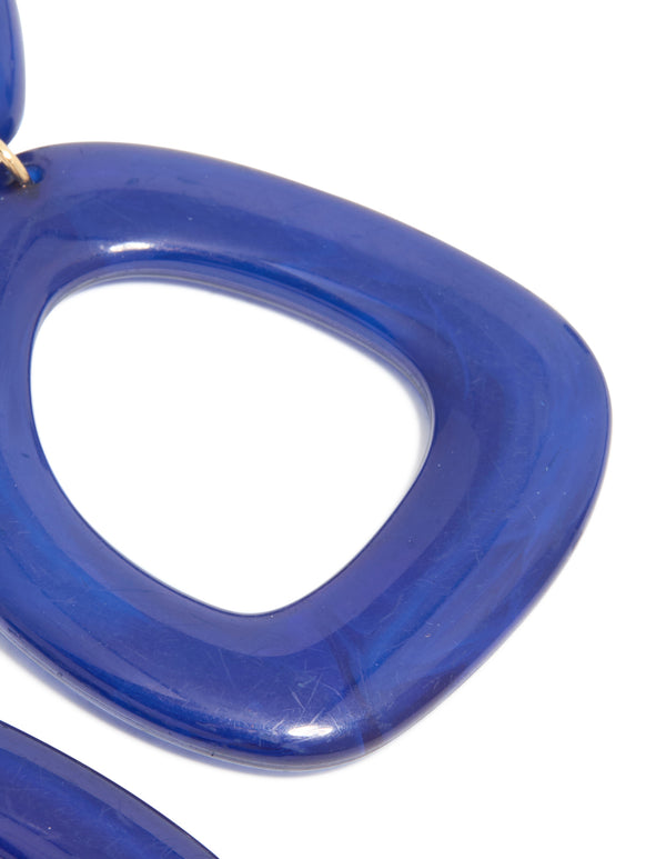 Dark blue acrylic organic square-oval drop earrings with statement style in post detail view