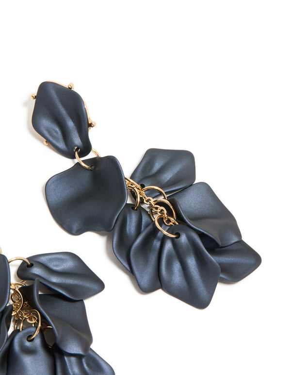 Stunning navy blue coated metal flower petal drop earrings designed with gold accents in post detail view