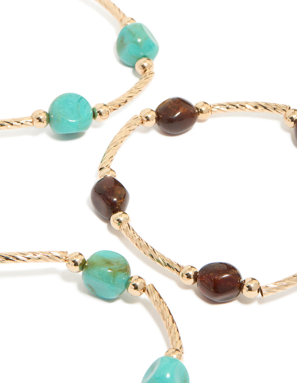 Capturing gold brown and turquoise beaded thin connector bracelets 4-pack close up view