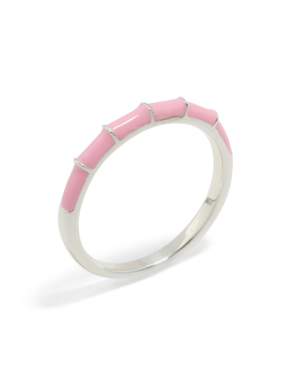 Beautiful sterling silver ring featuring in pink enamel side detail view