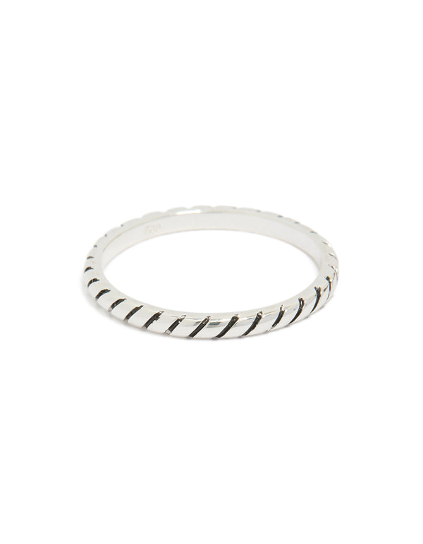 Showcasing a sterling silver textured black enamel statement ring front view