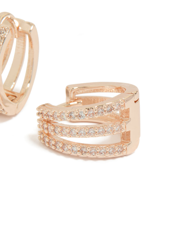 Highlighting the rose gold plated cubic zirconia layered hoop earrings post detail view