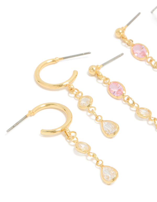 Crafted from brass, this gold plated multicoloured diamantes drop and stud earrings 4-pack in pink accents close up view