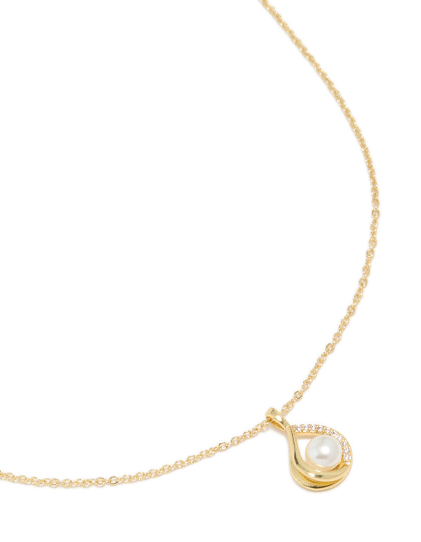 Elegantly designed gold plated teardrop pendant necklace featuring cubic zirconia and pearl accents, close up view