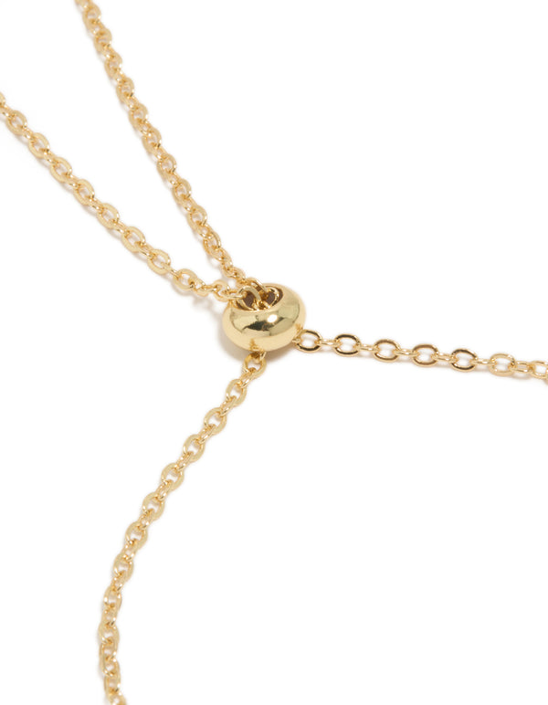 Crafted from gold plated material, this bracelet with cubic zirconia oval and round stone closure detail view
