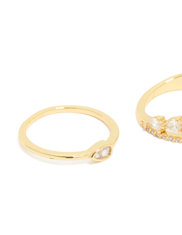 Designed with gold plated cubic zirconia teardrop and band rings featuring crystal in a dainty 3-pack side detail view