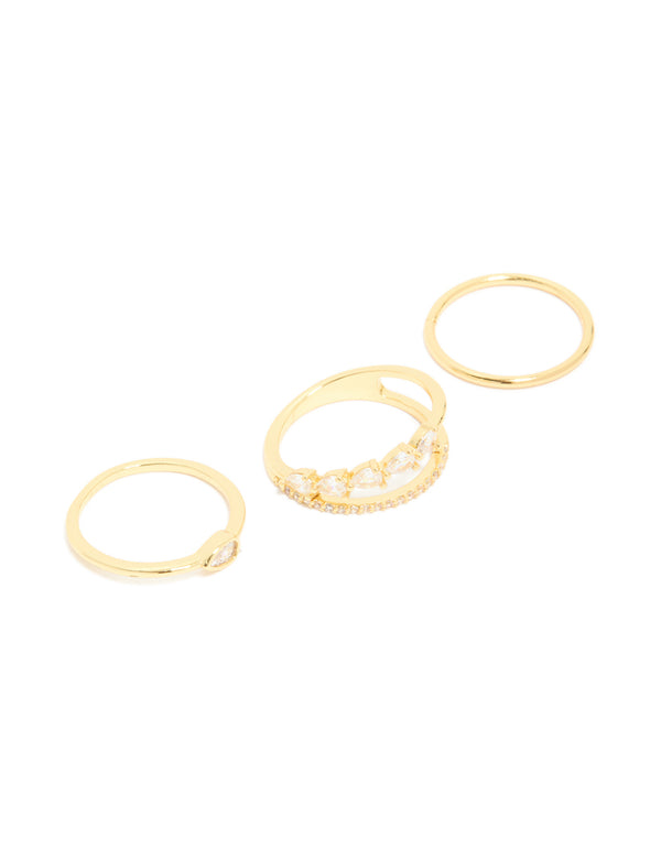 Crafted from gold plated material featuring cubic zirconia teardrop and band rings in a dainty 3-pack with crystal accents front view