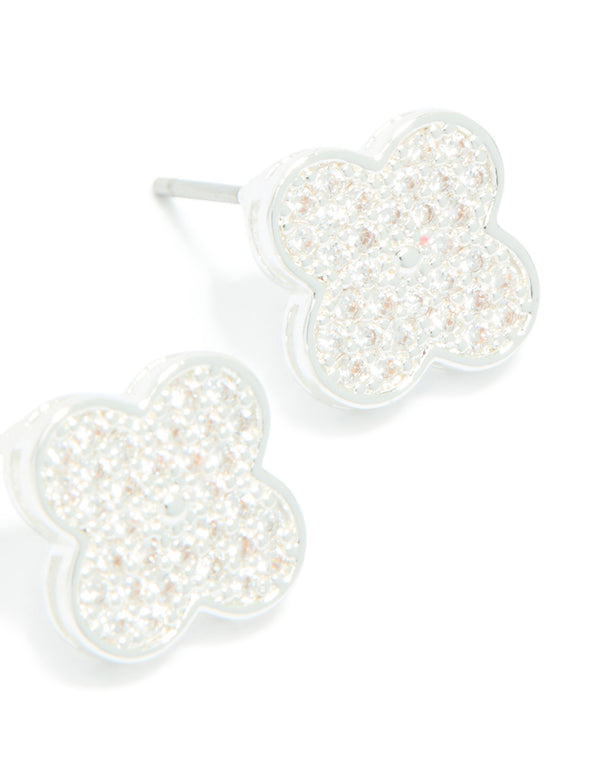 Admire dainty small floral stud earrings crafted from silver plated metal with cubic zirconia showcasing post detail view