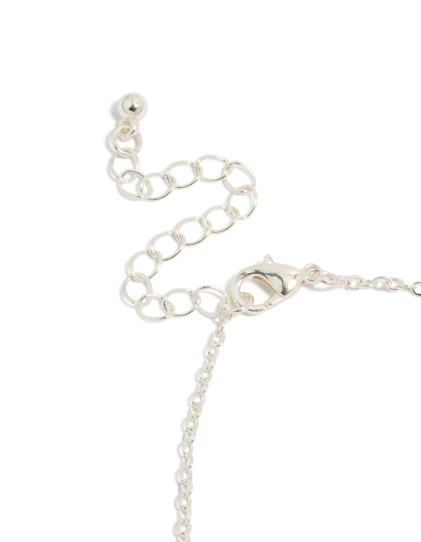 Showcasing the adjustable lobster clasp mechanism, this silver plated cubic zirconia outline flower bracelet highlights secure fastening closure detail view
