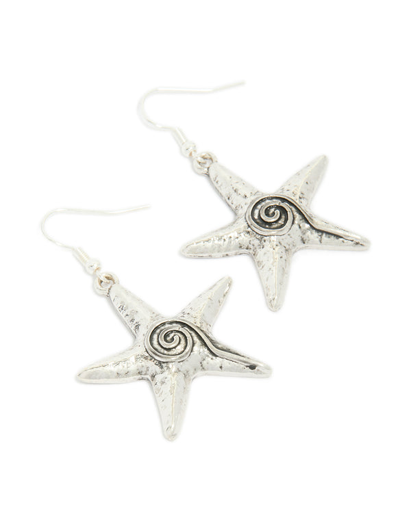Beautifully crafted antique silver swirl starfish hook earrings featuring ocean details in a front view