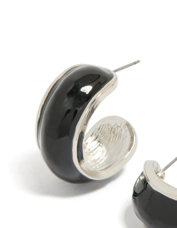 Featuring silver black outer wide hoop earrings with textured inner detail close up view