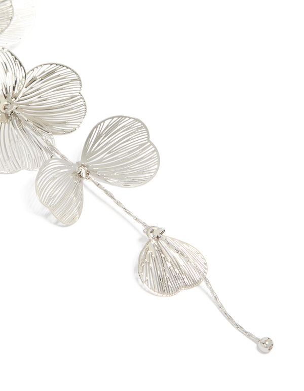 Designed with silver long floral drop earrings featuring petals in chain detail view