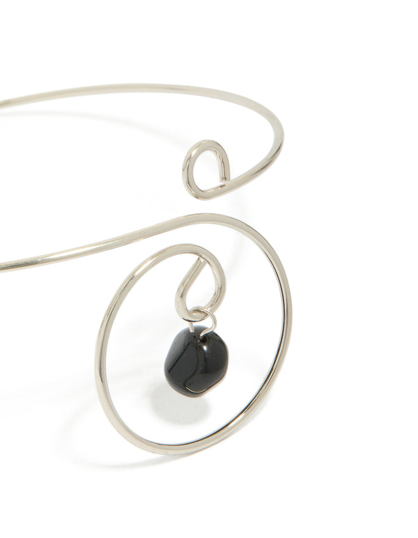 Crafted from silver, this dainty swirl black semi precious stone arm cuff features beads and charm with dainty styling close up view
