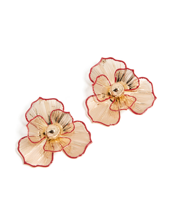 Showcasing statement red outline flower stud earrings in gold with floral pattern front view