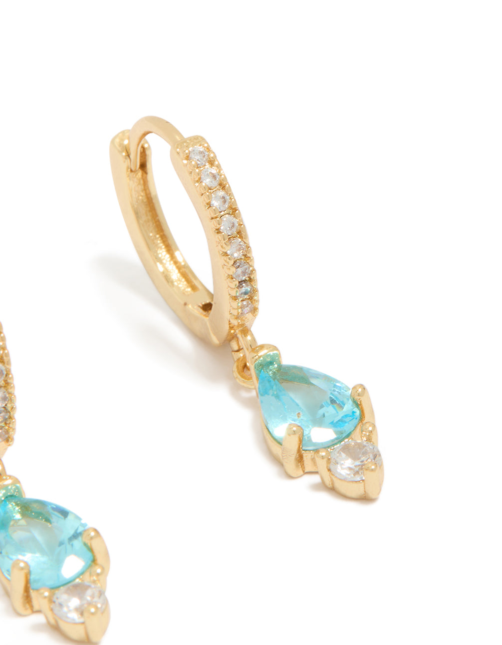 Elegant gold plated blue cubic zirconia huggie earrings post detail view