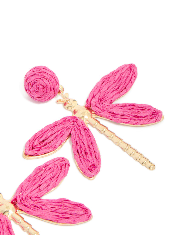 Featuring gold hot pink raffia dragonfly drop earrings crafted with animal detail in post detail view
