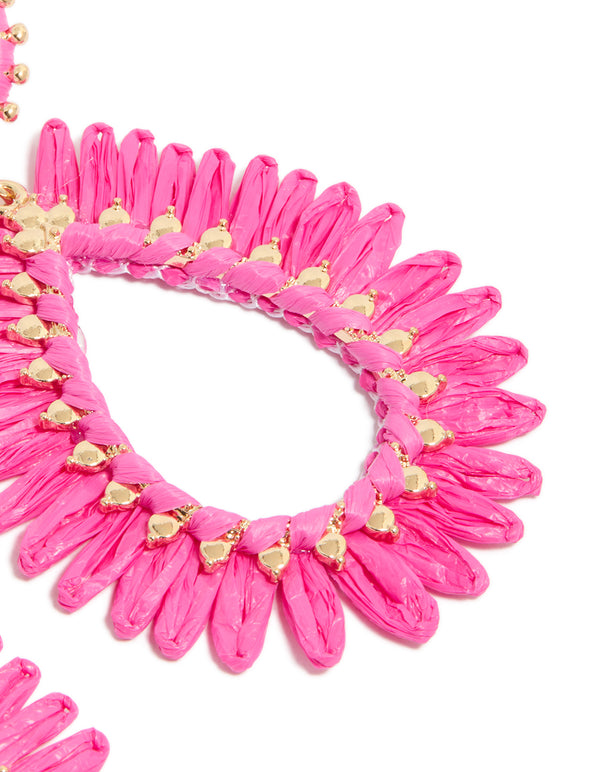 Explore statement gold hot pink raffia oval drop earrings post detail view