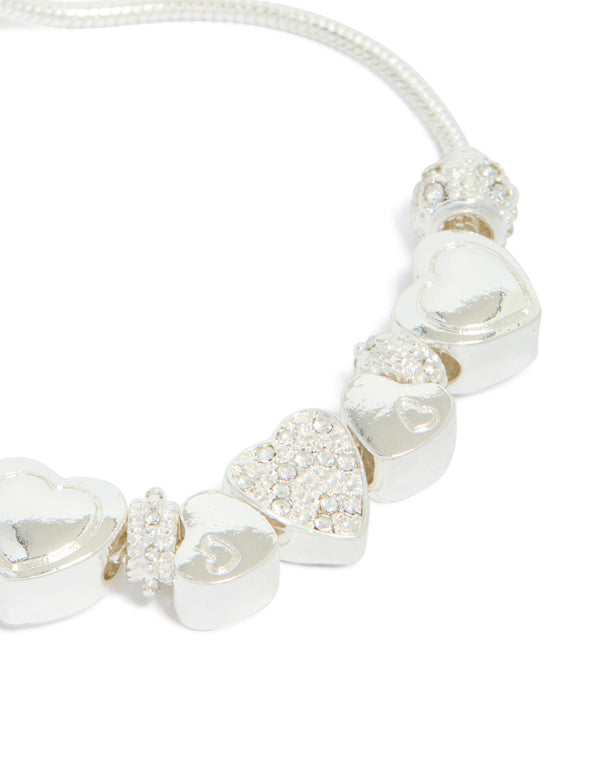 Crafted with silver diamante heart charm and balls designed with toggle closure close up view