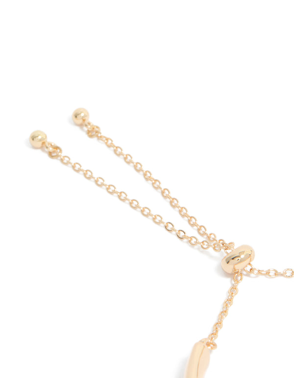 Showcasing gold celestial diamante toggle bangle with adjustable closure detail view
