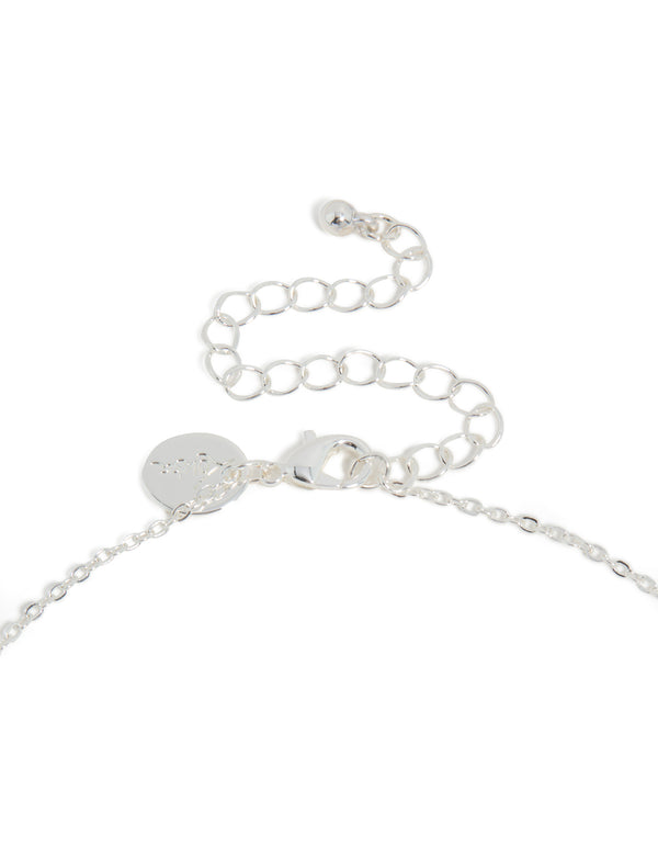 Detailed view of silver plated thin cubic zirconia initial letter K pendant necklace showcasing lobster clasp detail view