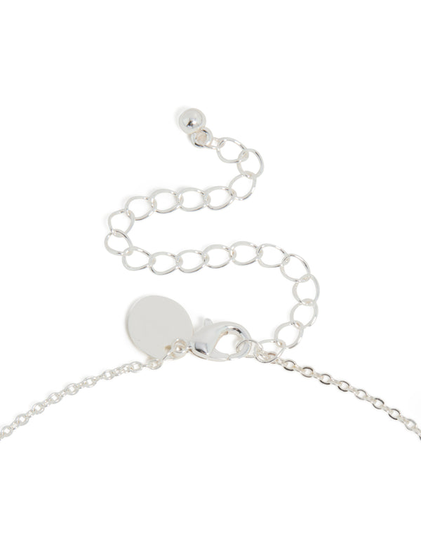 Showcasing a silver plated thin letter A necklace with a cubic zirconia pendant in a statement style, clasp detail view