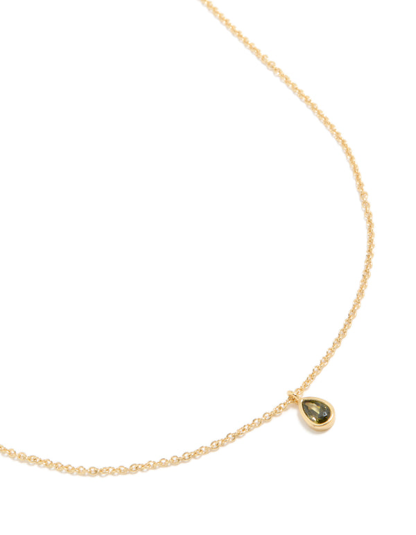 Showcasing a gold plated august birthstone necklace with pendant featuring cubic zirconia close up view