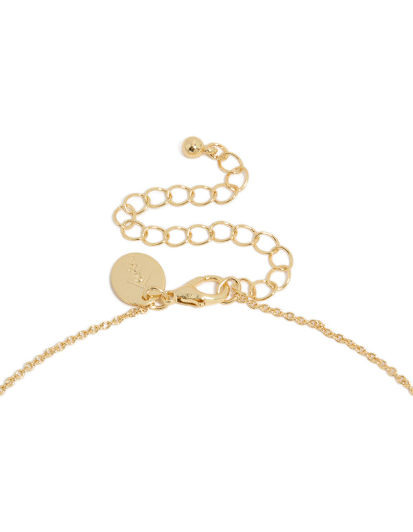 Explore a May birthstone necklace with a gold-plated cubic zirconia emerald pendant and dainty design, clasp detail view