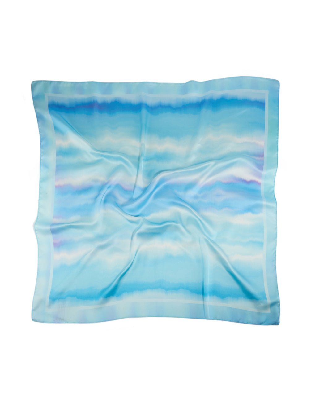Discover a tie-dye striped fabric scarf in sky blue, powder blue, light blue, and royal blue shades front view