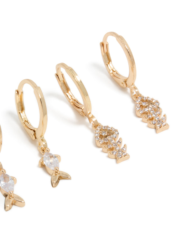 Featuring gold fish cubic zirconia huggie and stud earrings 3-pack with ocean elements post detail view