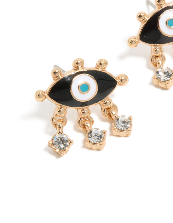 Featuring gold evil eye stud earrings with charm detailing and dark turquoise center close up view