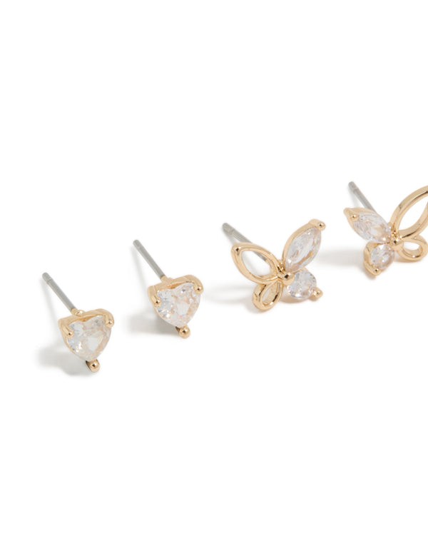 Showcasing gold stud earrings with butterfly and heart designs featuring cubic zirconia in a 3-pack close up view