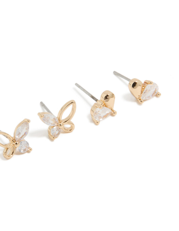 Featuring gold stud earrings with butterfly and heart designs crafted from cubic zirconia in a 3-pack post detail view