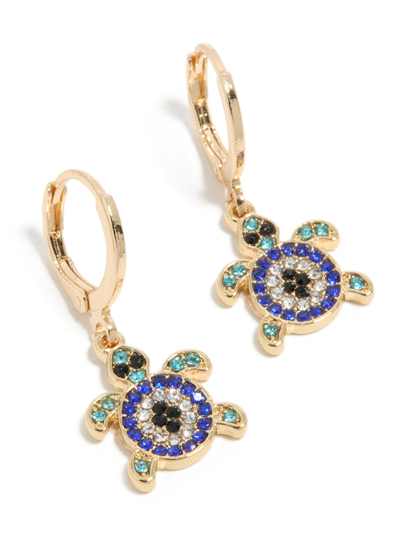 Showcasing gold with blue diamante turtle huggie earrings with ocean-inspired design featuring turquoise and black accents in a front view