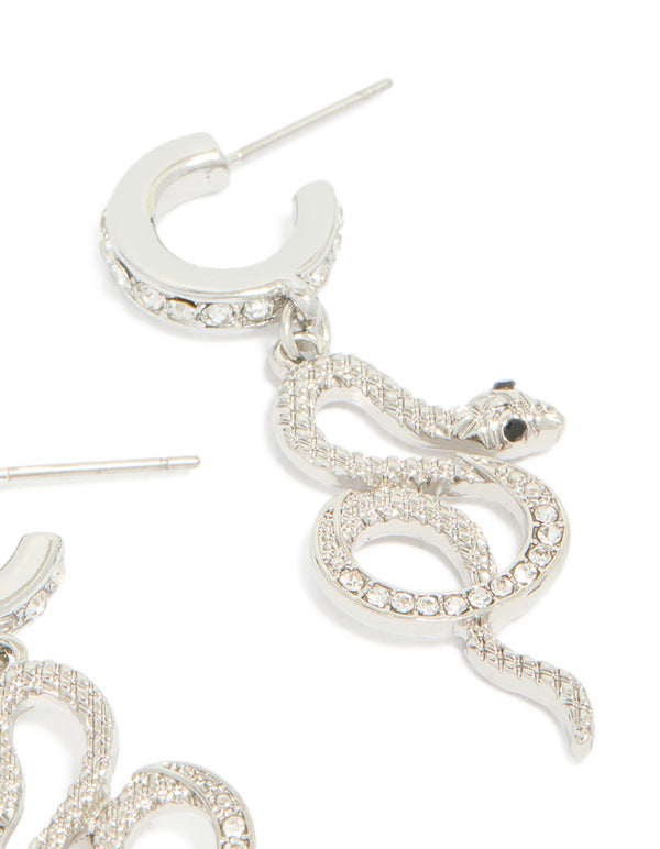 Highlighted are silver diamante snake huggie earrings in statement style post detail view