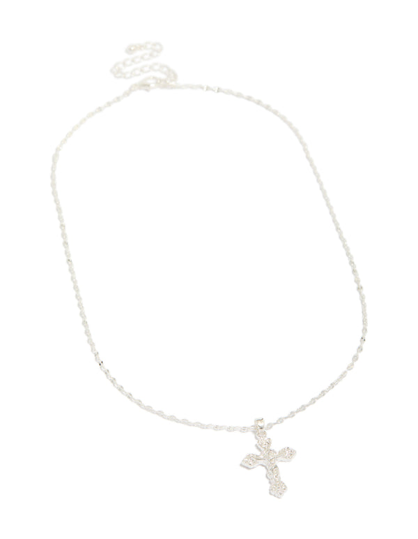 Elegant vintage cross charm pendant necklace in silver plated material featuring statement design front view