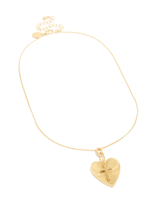 Featuring a gold plated cubic zirconia heart, cross necklace with pendant front view