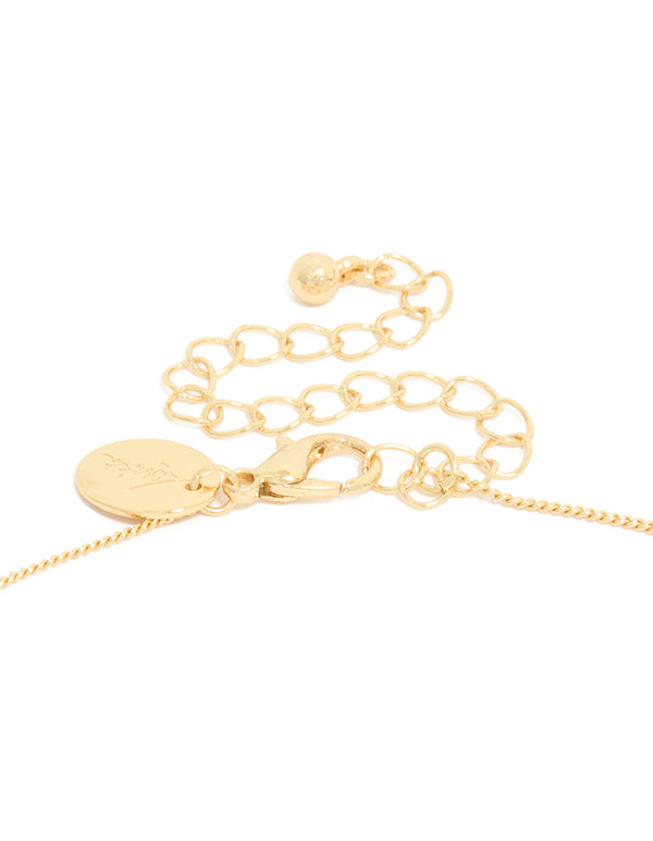 Displaying a gold plated cubic zirconia heart, cross necklace with pendant clasp detail view