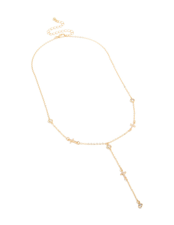 Displaying a gold plated cubic zirconia bezel set cross rosary necklace in statement style front view