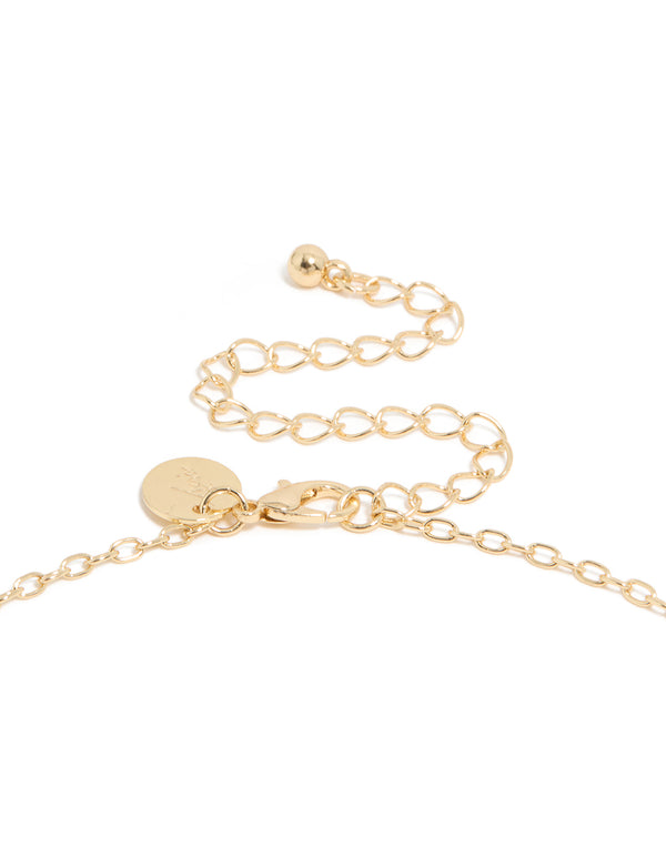 Crafted from gold plated material this dainty semi precious stone chip rosary necklace with beaded and cross in statement style clasp detail view