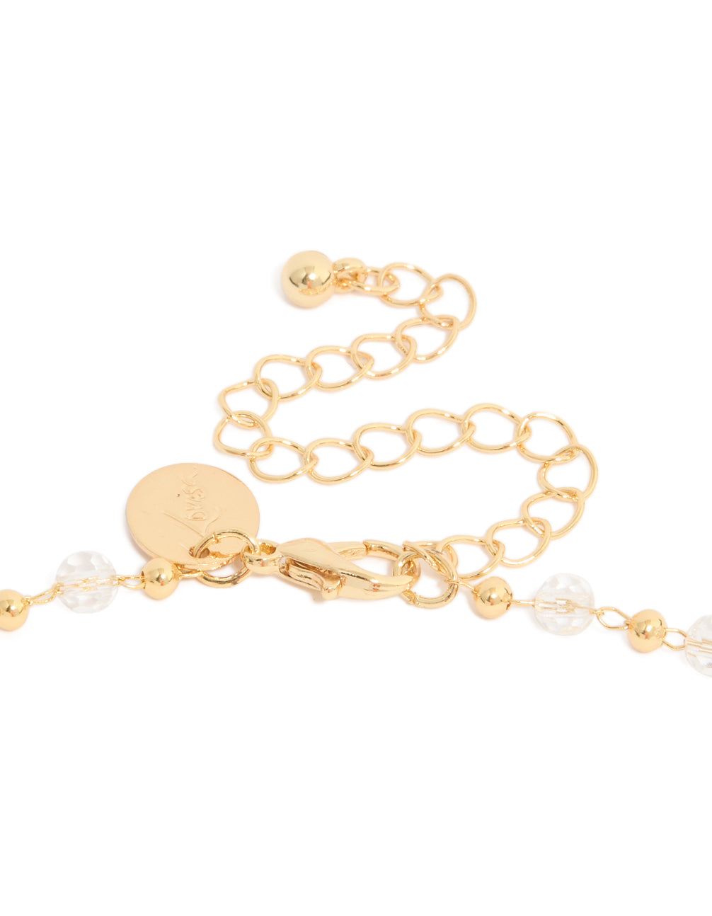 Highlighting a gold plated dainty beaded rosary cross Y-necklace with balls in white accents clasp detail view